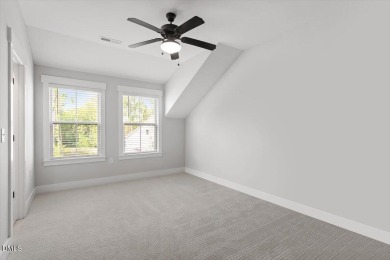 This beautifully designed and meticulously maintained on Hasentree Club in North Carolina - for sale on GolfHomes.com, golf home, golf lot