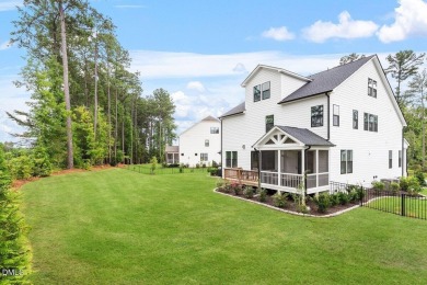 This beautifully designed and meticulously maintained on Hasentree Club in North Carolina - for sale on GolfHomes.com, golf home, golf lot