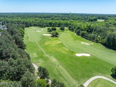 This beautifully designed and meticulously maintained on Hasentree Club in North Carolina - for sale on GolfHomes.com, golf home, golf lot
