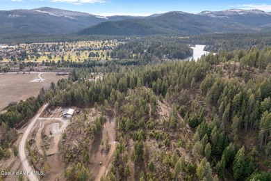 Wind through gorgeous terrain to reach ''forever views'' perched on Stoneridge Golf Club in Idaho - for sale on GolfHomes.com, golf home, golf lot
