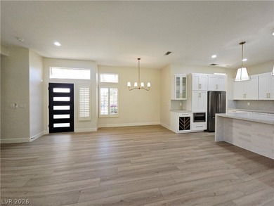 VIEW THIS GORGEOUS RENOVATION OF THE POPULAR TAHOE OPEN PLAN in on Highland Falls Golf Club in Nevada - for sale on GolfHomes.com, golf home, golf lot