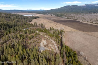 Wind through gorgeous terrain to reach ''forever views'' perched on Stoneridge Golf Club in Idaho - for sale on GolfHomes.com, golf home, golf lot