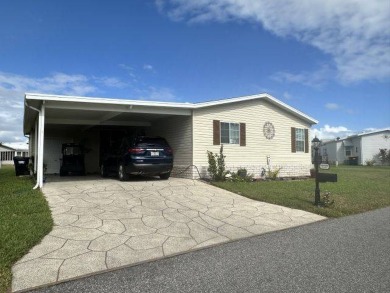 Welcome to this beautifully remodeled 3-bedroom, 2-bathroom home on Four Lakes Golf Club in Florida - for sale on GolfHomes.com, golf home, golf lot