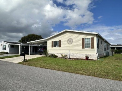 Welcome to this beautifully remodeled 3-bedroom, 2-bathroom home on Four Lakes Golf Club in Florida - for sale on GolfHomes.com, golf home, golf lot