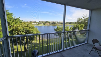 Enjoy serene lake views from this bright and spacious 3-bedroom on Palm-Aire Country Club and Resort - Palms in Florida - for sale on GolfHomes.com, golf home, golf lot