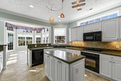 This 4 bedroom, 2.5 bath home in Legends Golf Resort sits on the on Legends Golf Club in South Carolina - for sale on GolfHomes.com, golf home, golf lot