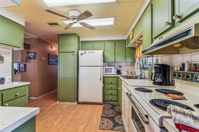 RARE Lakefront Double Wide in Highly Sought after Glenwood on Largo Golf Course in Florida - for sale on GolfHomes.com, golf home, golf lot