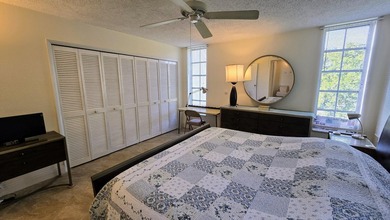 Enjoy serene lake views from this bright and spacious 3-bedroom on Palm-Aire Country Club and Resort - Palms in Florida - for sale on GolfHomes.com, golf home, golf lot