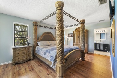 Welcome to your turnkey villa in the prestigious man-gated on Eastpointe Country Club in Florida - for sale on GolfHomes.com, golf home, golf lot