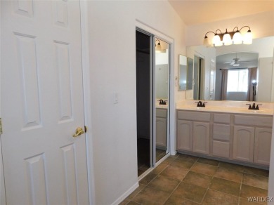 Discover this stunning 3-bedroom, 2-bath home located on a on Desert Lakes Golf Course in Arizona - for sale on GolfHomes.com, golf home, golf lot
