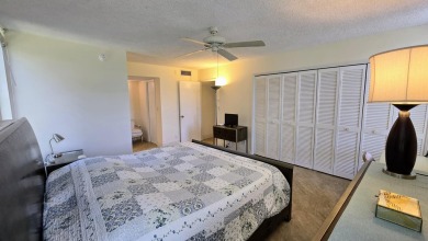 Enjoy serene lake views from this bright and spacious 3-bedroom on Palm-Aire Country Club and Resort - Palms in Florida - for sale on GolfHomes.com, golf home, golf lot