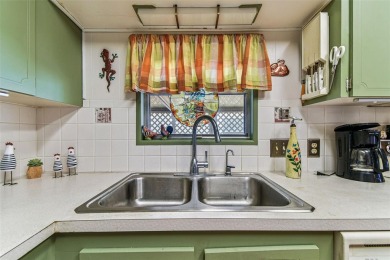 RARE Lakefront Double Wide in Highly Sought after Glenwood on Largo Golf Course in Florida - for sale on GolfHomes.com, golf home, golf lot