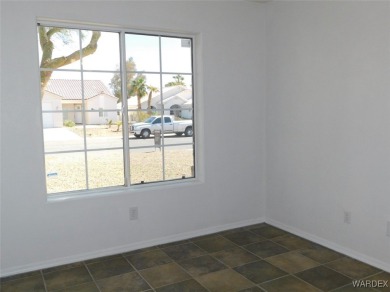 Discover this stunning 3-bedroom, 2-bath home located on a on Desert Lakes Golf Course in Arizona - for sale on GolfHomes.com, golf home, golf lot
