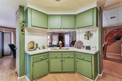RARE Lakefront Double Wide in Highly Sought after Glenwood on Largo Golf Course in Florida - for sale on GolfHomes.com, golf home, golf lot