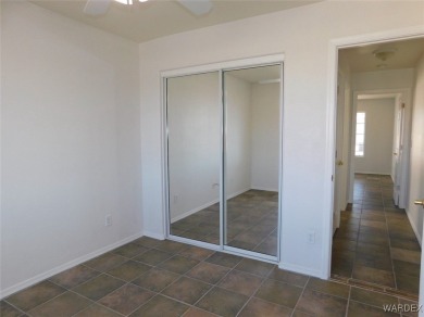 Discover this stunning 3-bedroom, 2-bath home located on a on Desert Lakes Golf Course in Arizona - for sale on GolfHomes.com, golf home, golf lot