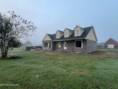 A BRAND NEW, QUALITY-CONSTRUCTED RANCHER WITH 2100 SQUARE on River Islands Golf Club in Tennessee - for sale on GolfHomes.com, golf home, golf lot