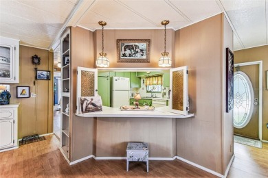 RARE Lakefront Double Wide in Highly Sought after Glenwood on Largo Golf Course in Florida - for sale on GolfHomes.com, golf home, golf lot