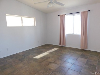 Discover this stunning 3-bedroom, 2-bath home located on a on Desert Lakes Golf Course in Arizona - for sale on GolfHomes.com, golf home, golf lot