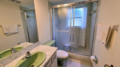 Enjoy serene lake views from this bright and spacious 3-bedroom on Palm-Aire Country Club and Resort - Palms in Florida - for sale on GolfHomes.com, golf home, golf lot