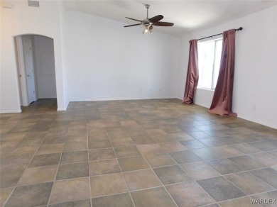 Discover this stunning 3-bedroom, 2-bath home located on a on Desert Lakes Golf Course in Arizona - for sale on GolfHomes.com, golf home, golf lot