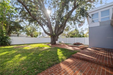 Step into this charming 3-bedroom, 3-bathroom home in the on Palma Ceia Golf and Country Club in Florida - for sale on GolfHomes.com, golf home, golf lot