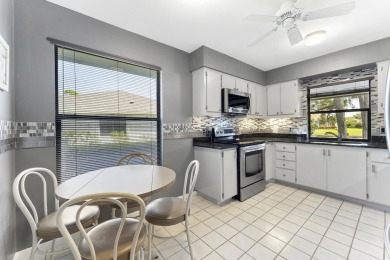 Welcome to your turnkey villa in the prestigious man-gated on Eastpointe Country Club in Florida - for sale on GolfHomes.com, golf home, golf lot