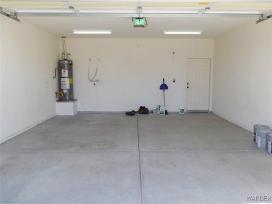 Discover this stunning 3-bedroom, 2-bath home located on a on Desert Lakes Golf Course in Arizona - for sale on GolfHomes.com, golf home, golf lot