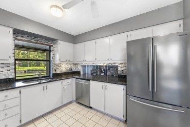 Welcome to your turnkey villa in the prestigious man-gated on Eastpointe Country Club in Florida - for sale on GolfHomes.com, golf home, golf lot