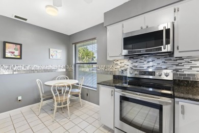 Welcome to your turnkey villa in the prestigious man-gated on Eastpointe Country Club in Florida - for sale on GolfHomes.com, golf home, golf lot