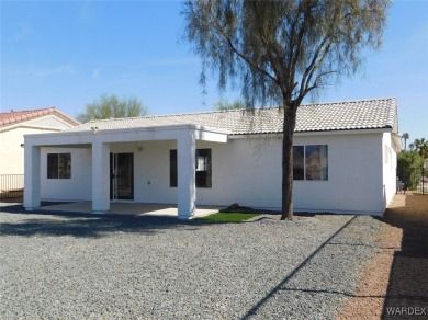Discover this stunning 3-bedroom, 2-bath home located on a on Desert Lakes Golf Course in Arizona - for sale on GolfHomes.com, golf home, golf lot