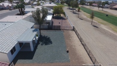 Discover this stunning 3-bedroom, 2-bath home located on a on Desert Lakes Golf Course in Arizona - for sale on GolfHomes.com, golf home, golf lot