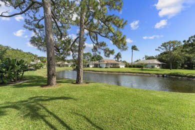 Welcome to your turnkey villa in the prestigious man-gated on Eastpointe Country Club in Florida - for sale on GolfHomes.com, golf home, golf lot