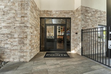 Welcome to your turnkey villa in the prestigious man-gated on Eastpointe Country Club in Florida - for sale on GolfHomes.com, golf home, golf lot