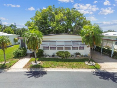 RARE Lakefront Double Wide in Highly Sought after Glenwood on Largo Golf Course in Florida - for sale on GolfHomes.com, golf home, golf lot