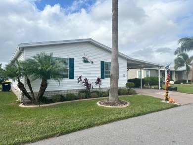 Discover your dream lifestyle in this stunning 3-bedroom, 2-bath on Four Lakes Golf Club in Florida - for sale on GolfHomes.com, golf home, golf lot