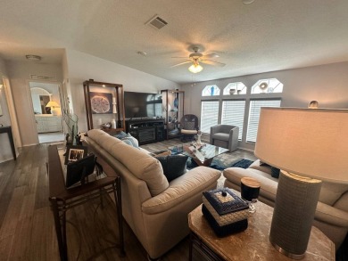 Discover your dream lifestyle in this stunning 3-bedroom, 2-bath on Four Lakes Golf Club in Florida - for sale on GolfHomes.com, golf home, golf lot