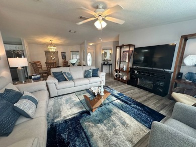 Discover your dream lifestyle in this stunning 3-bedroom, 2-bath on Four Lakes Golf Club in Florida - for sale on GolfHomes.com, golf home, golf lot