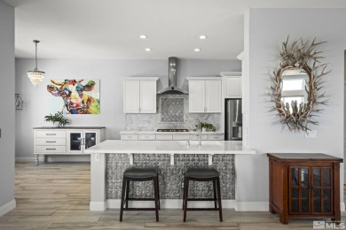 Gorgeously landscaped 1-story home in the desirable Grand Vistas on Hidden Valley Country Club in Nevada - for sale on GolfHomes.com, golf home, golf lot