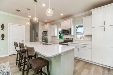 Welcome to your slice of coastal luxury in Lost Key Beach and on Lost Key Golf Club in Florida - for sale on GolfHomes.com, golf home, golf lot