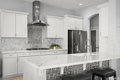 Gorgeously landscaped 1-story home in the desirable Grand Vistas on Hidden Valley Country Club in Nevada - for sale on GolfHomes.com, golf home, golf lot