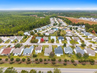 Now available is this wonderful one level ranch style home in on Sandpiper Bay Golf and Country Club in North Carolina - for sale on GolfHomes.com, golf home, golf lot