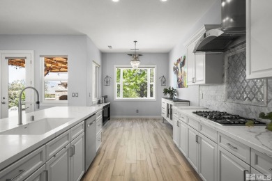 Gorgeously landscaped 1-story home in the desirable Grand Vistas on Hidden Valley Country Club in Nevada - for sale on GolfHomes.com, golf home, golf lot