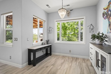 Gorgeously landscaped 1-story home in the desirable Grand Vistas on Hidden Valley Country Club in Nevada - for sale on GolfHomes.com, golf home, golf lot