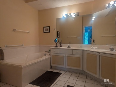 Motivated Seller! This spacious 2BR/2BA ground-floor condo on Craft Farms - Cypress Bend in Alabama - for sale on GolfHomes.com, golf home, golf lot