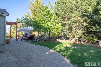 Gorgeously landscaped 1-story home in the desirable Grand Vistas on Hidden Valley Country Club in Nevada - for sale on GolfHomes.com, golf home, golf lot