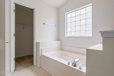 Now available is this wonderful one level ranch style home in on Sandpiper Bay Golf and Country Club in North Carolina - for sale on GolfHomes.com, golf home, golf lot