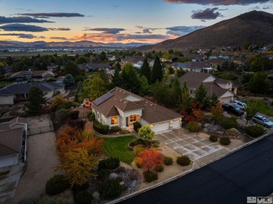 Gorgeously landscaped 1-story home in the desirable Grand Vistas on Hidden Valley Country Club in Nevada - for sale on GolfHomes.com, golf home, golf lot