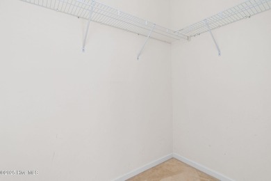 Now available is this wonderful one level ranch style home in on Sandpiper Bay Golf and Country Club in North Carolina - for sale on GolfHomes.com, golf home, golf lot