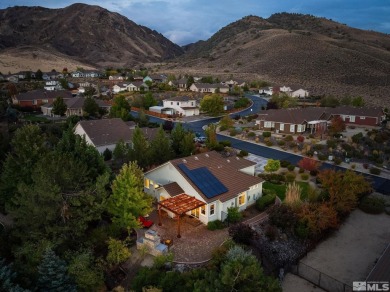 Gorgeously landscaped 1-story home in the desirable Grand Vistas on Hidden Valley Country Club in Nevada - for sale on GolfHomes.com, golf home, golf lot