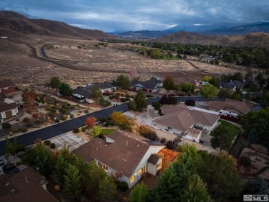 Gorgeously landscaped 1-story home in the desirable Grand Vistas on Hidden Valley Country Club in Nevada - for sale on GolfHomes.com, golf home, golf lot
